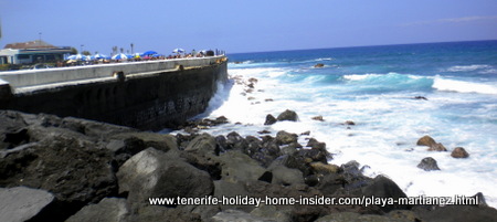 Artificial barrier reef by Lago Martianez and its beach Bay