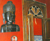 Buddha relief on the wall in retro restaurant Tenerife