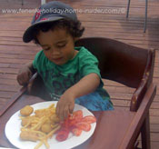 Children meal at family restaurant beach club