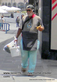 A cool fisherman with dark sun glasses and headphones