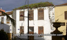 Old House in old town Los Realejos with Tabaiba on roof.