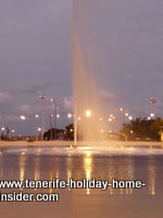 Plaza Espana illuminated at night by its lake in Santa Cruz Tenerife.