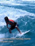 Professional surfer on Martianez beach Tenerife