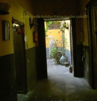 Romantic, dimmed indoor passage of Rocamar the oceanview restaurant