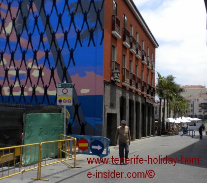 Street art by Victor Ash in the old quarters of Puerto de la Cruz of Tenerife near its little port.
