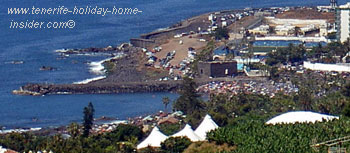 Parking shown by Playa Jardin bird eye photo